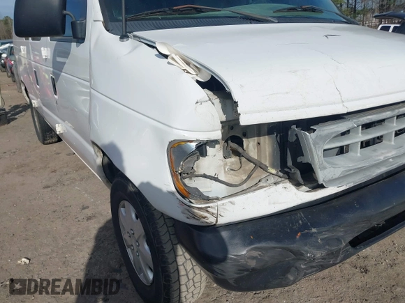 2002 Ford Econoline Cargo with VIN 1FTRE14252HB67887, listed as a IAAI auction lot 41180872 with 274,561 mi miles and . Bid and sale history available at carsss.com. Image 6.