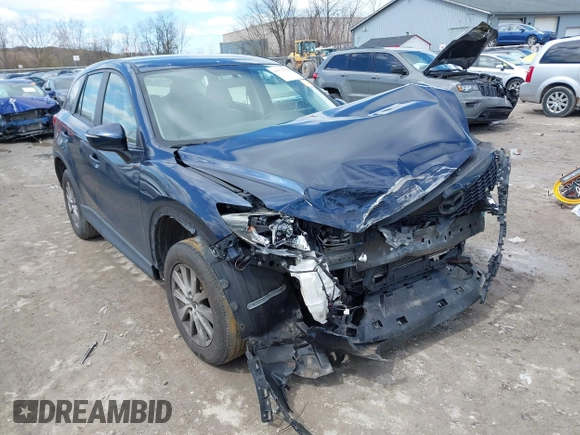 2015 Mazda CX-5 Sport with VIN JM3KE4BY3F0503011, listed as a IAAI auction lot 41973501 with 191,064 mi miles and . Bid and sale history available at carsss.com. Image 1.