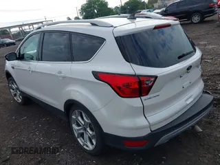 2019 Ford Escape Titanium with VIN 1FMCU9J97KUA03195, listed as a IAAI auction lot 42656589 with 40,099 mi miles and . Bid and sale history available at DreamBid. Image 3.