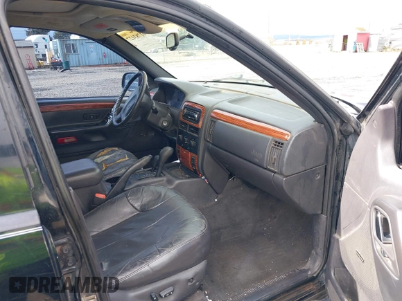 2001 Jeep Grand Cherokee Laredo with VIN 1J4GW48N61C642351, listed as a IAAI auction lot 41783127 with 194,578 mi miles and . Bid and sale history available at DreamBid. Image 5.