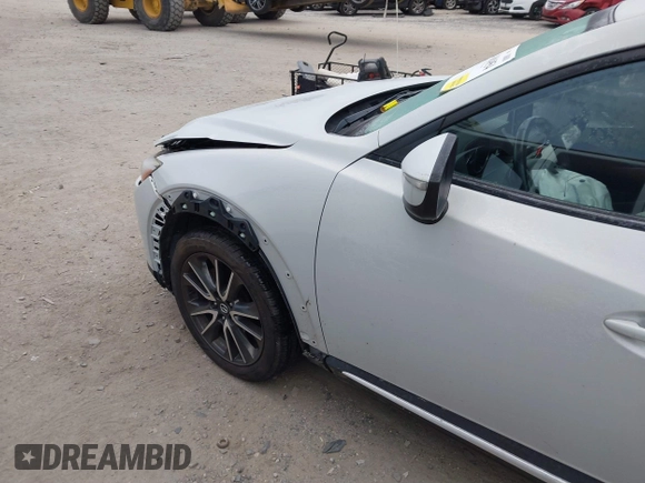 2016 Mazda CX-3 Grand Touring with VIN JM1DKFD7XG0132084, listed as a IAAI auction lot 41004954 with 70,476 mi miles. Bid and sale history available at carsss.com. Image 6.