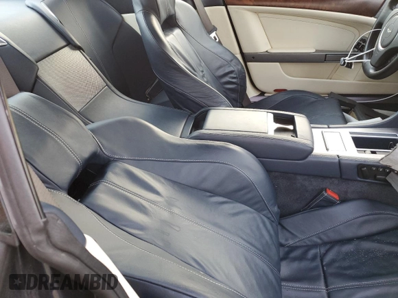 2009 Aston Martin DB9 z VIN SCFAD01E79GA12139, wystawiony jako Copart lot #76241164 z przebiegiem Nie podano mil oraz Szkody całkowita. Historia ofert i sprzedaży dostępna na DreamBid. Obrazek 10.