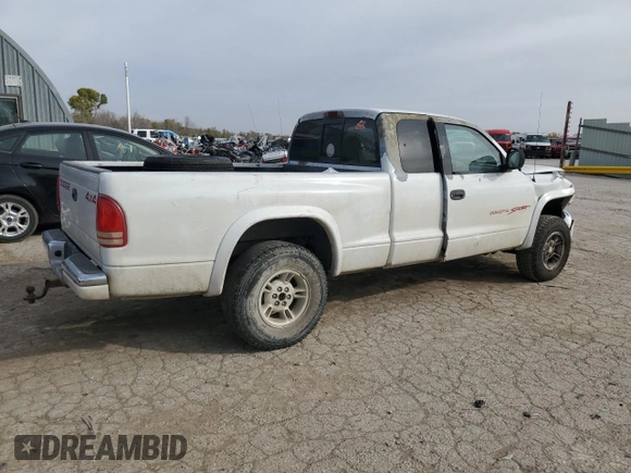 1997 Dodge Dakota z VIN 1B7GG23Y8VS161313, wystawiony jako Copart lot #77646454 z przebiegiem 286 443 mil mil oraz Szkoda całkowita • Salvage title. Historia ofert i sprzedaży dostępna na DreamBid. Obrazek 3.
