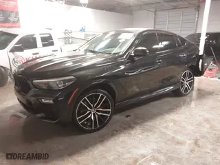 2021 BMW X6 xDrive40i with VIN 5UXCY6C03M9E61703, listed as a IAAI auction lot 41602401 with 1 mi miles. Bid and sale history available at carsss.com. Image 17.