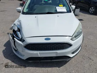 2018 Ford Focus SE with VIN 1FADP3F29JL213008, listed as a IAAI auction lot 41790224 with 85,056 mi miles and . Bid and sale history available at DreamBid. Image 13.