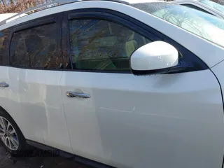 2015 Nissan Pathfinder Platinum z VIN 5N1AR2MM1FC636352, wystawiony jako IAAI lot #38486561 z przebiegiem 105 934 mil mil oraz . Historia ofert i sprzedaży dostępna na DreamBid. Obrazek 13.
