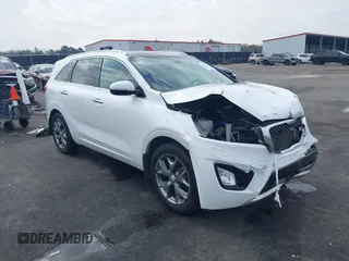2016 Kia Sorento SX with VIN 5XYPK4A52GG115259, listed as a IAAI auction lot 41494198 with 118,143 mi miles. Bid and sale history available at carsss.com. Image 1.