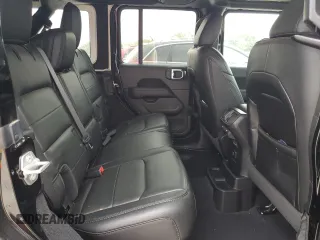 2021 Jeep Wrangler Unlimited Sahara Altitude with VIN 1C4HJXEGXMW671418, listed as a Copart auction lot 68116854 with 38,680 mi miles and Salvage title. Bid and sale history available at DreamBid. Image 12.