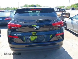 2019 Hyundai Tucson Value with VIN KM8J3CA46KU935335, listed as a IAAI auction lot 42296162 with 65,099 mi miles and . Bid and sale history available at DreamBid. Image 16.
