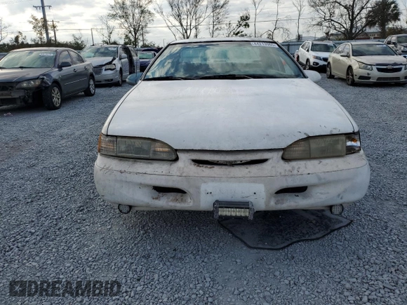 1994 Ford Thunderbird LX with VIN 1FALP62W6RH206764, listed as a Copart auction lot 44213965 with 105,353 mi miles and Salvage Title. Bid and sale history available at DreamBid. Image 5.