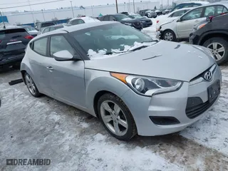 2015 Hyundai Veloster with VIN KMHTC6AD4FU236883, listed as a IAAI auction lot 41530831 with 103,371 mi miles. Bid and sale history available at carsss.com. Image 1.