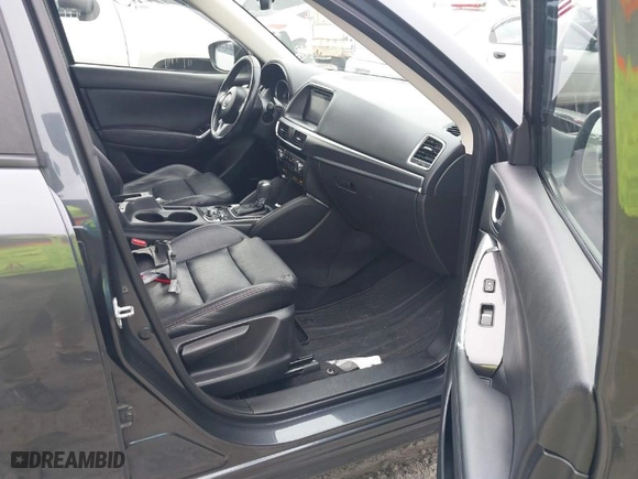 2016 Mazda CX-5 Grand Touring with VIN JM3KE4DY8G0796290, listed as a IAAI auction lot 41619977 with NaN miles. Bid and sale history available at carsss.com. Image 5.