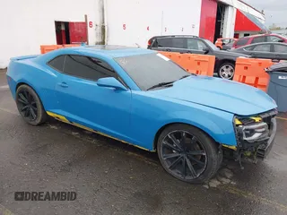 2014 Chevrolet Camaro LT z VIN 2G1FC1E38E9259867, wystawiony jako IAAI lot #41958980 z przebiegiem 130 587 mil mil oraz . Historia ofert i sprzedaży dostępna na DreamBid. Obrazek 1.