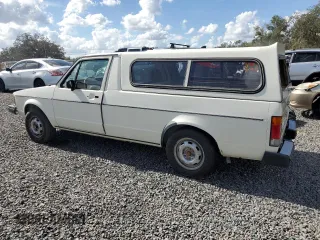 1983 Volkswagen Rabbit z VIN 1V1KG0170DV038002, wystawiony jako Copart lot #79815264 z przebiegiem 147 480 mil mil oraz Szkody całkowita. Historia ofert i sprzedaży dostępna na DreamBid. Obrazek 2.