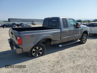 2013 Ford F-250 XL with VIN 1FT7X2BT2DEA39811, listed as a Copart auction lot 59900645 with 207,868 mi miles and Salvage title. Bid and sale history available at DreamBid. Image 3.