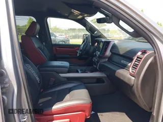 2019 Ram 1500 Rebel with VIN 1C6SRFLT8KN797618, listed as a IAAI auction lot 42556663 with 92,606 mi miles and . Bid and sale history available at DreamBid. Image 5.