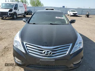 2014 Hyundai Azera Limited z VIN KMHFH4JG3EA424176, wystawiony jako Copart lot #55837825 z przebiegiem 133 781 mil mil oraz Szkoda całkowita • Salvage title. Historia ofert i sprzedaży dostępna na DreamBid. Obrazek 5.