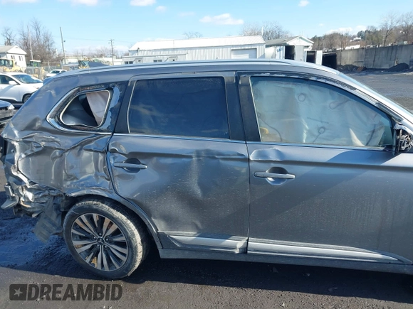 2020 Mitsubishi Outlander ES z VIN JA4AZ3A32LZ040935, wystawiony jako IAAI lot #41521469 z przebiegiem 86 106 mil mil oraz . Historia ofert i sprzedaży dostępna na DreamBid. Obrazek 6.