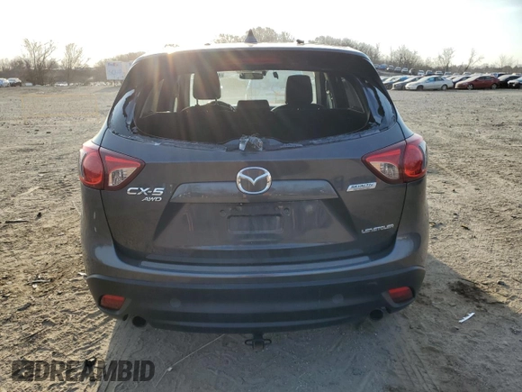 2014 Mazda CX-5 Grand Touring with VIN JM3KE4DY5E0372787, listed as a Copart auction lot 48873675 with 136,784 mi miles and Salvage Title. Bid and sale history available at carsss.com. Image 6.