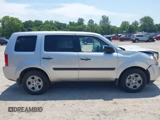 2014 Honda Pilot LX with VIN 5FNYF4H22EB024677, listed as a IAAI auction lot 42645408 with 133,271 mi miles and . Bid and sale history available at DreamBid. Image 13.