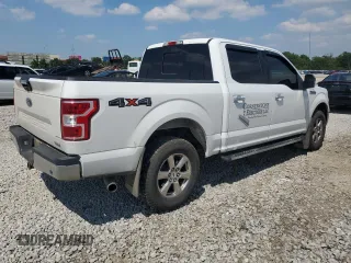 2018 Ford F-150 XL with VIN 1FTEW1EP0JFA28850, listed as a Copart auction lot 63585615 with 210,626 mi miles and Salvage title. Bid and sale history available at DreamBid. Image 3.