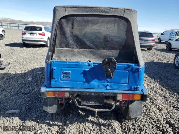 1986 Suzuki Samurai with VIN JS4JC51C8G4114216, listed as a Copart auction lot 46191465 with 67,177 mi miles and Clean Title. Bid and sale history available at carsss.com. Image 6.