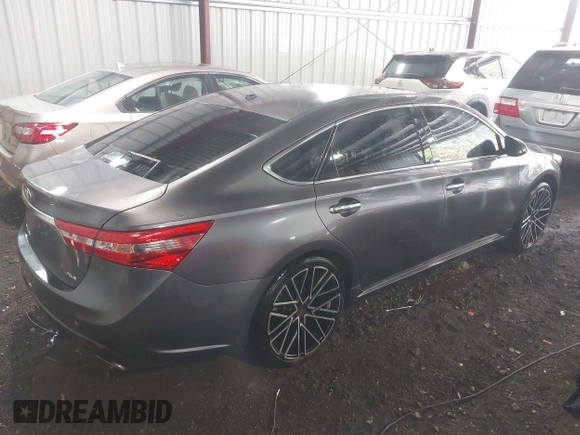 2015 Toyota Avalon Limited with VIN 4T1BK1EB6FU164773, listed as a IAAI auction lot 41877742 with 128,858 mi miles and . Bid and sale history available at DreamBid. Image 4.
