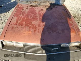 1981 Toyota Celica z VIN JT2RA44C1B0014985, wystawiony jako Copart lot #78658324 z przebiegiem Nie podano mil oraz Czysty tytuł • Clean title. Historia ofert i sprzedaży dostępna na DreamBid. Obrazek 11.