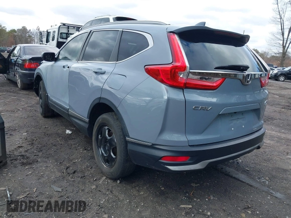 2021 Honda CR-V Touring with VIN 2HKRW2H90MH680172, listed as a IAAI auction lot 41708749 with 26,619 mi miles. Bid and sale history available at carsss.com. Image 3.