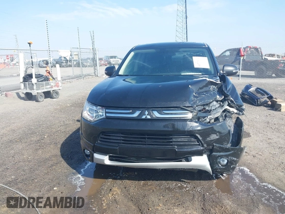 2014 Mitsubishi Outlander GT with VIN JA4JZ4AX8EZ016070, listed as a IAAI auction lot 41771934 with 157,724 mi miles and . Bid and sale history available at DreamBid. Image 12.