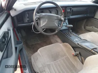 1991 Pontiac Firebird with VIN 1G2FS23E5ML200758, listed as a Copart auction lot 84013464 with 156,810 mi miles and Salvage title. Bid and sale history available at DreamBid. Image 8.