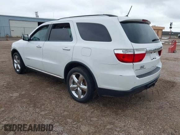 2013 Dodge Durango Citadel with VIN 1C4RDHEG2DC672632, listed as a IAAI auction lot 42432340 with 246,901 mi miles and . Bid and sale history available at DreamBid. Image 3.