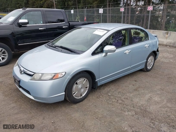 2007 Honda Civic Hybrid with VIN JHMFA36277S023418, listed as a IAAI auction lot 41846907 with 182,939 mi miles. Bid and sale history available at carsss.com. Image 2.