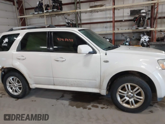 2009 Mercury Mariner Premier with VIN 4M2CU97729KJ00086, listed as a IAAI auction lot 41418490 with 167,486 mi miles. Bid and sale history available at carsss.com. Image 13.