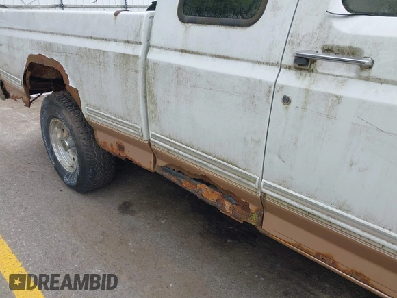 1995 Ford F-150 z VIN 1FTEX14H6SKC19656, wystawiony jako IAAI lot #42289301 z przebiegiem Nie podano mil oraz . Historia ofert i sprzedaży dostępna na DreamBid. Obrazek 12.