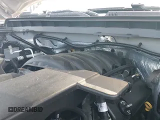 2018 Chevrolet Silverado 1500 Work Truck z VIN 1GCVKNEC6JZ267513, wystawiony jako IAAI lot #42518480 z przebiegiem 87 046 mil mil oraz . Historia ofert i sprzedaży dostępna na DreamBid. Obrazek 19.