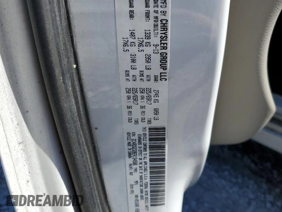 2014 Dodge Grand Caravan SXT z VIN 2C4RDGCG9ER154586, wystawiony jako Copart lot #50262835 z przebiegiem 201 612 mil mil oraz Czysty tytuł • Clean title. Historia ofert i sprzedaży dostępna na DreamBid. Obrazek 13.