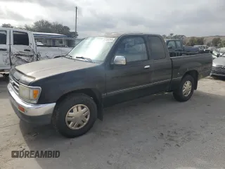 1997 Toyota T100 DX z VIN JT4TN12D4V0036544, wystawiony jako Copart lot #87395344 z przebiegiem 200 227 mil mil oraz Tytuł czysty. Historia ofert i sprzedaży dostępna na DreamBid. Obrazek 1.