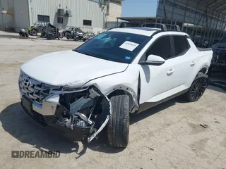 2023 Hyundai Santa Cruz SEL Premium z VIN 5NTJDDAF2PH075610, wystawiony jako IAAI lot #41855459 z przebiegiem 17 872 mil mil oraz . Historia ofert i sprzedaży dostępna na DreamBid. Obrazek 16.