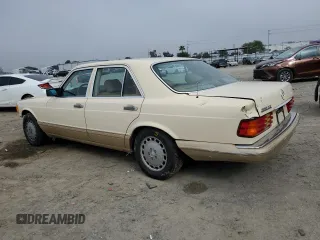 1989 Mercedes-Benz 300 with VIN WDBCA24D2KA430787, listed as a Copart auction lot 50655785 with 145,064 mi miles and Salvage Title. Bid and sale history available at DreamBid. Image 2.