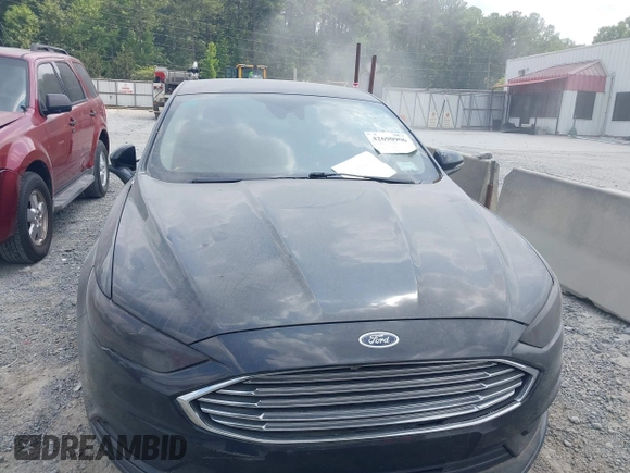 2017 Ford Fusion SE with VIN 3FA6P0HD0HR351408, listed as a IAAI auction lot 42690906 with 148,273 mi miles and . Bid and sale history available at DreamBid. Image 12.