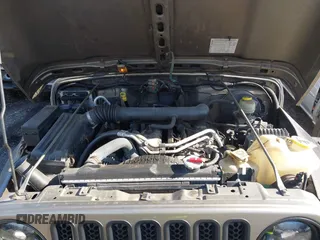 2004 Jeep Wrangler Sahara with VIN 1J4FA59S14P772264, listed as a IAAI auction lot 41814074 with 165,750 mi miles and . Bid and sale history available at DreamBid. Image 10.