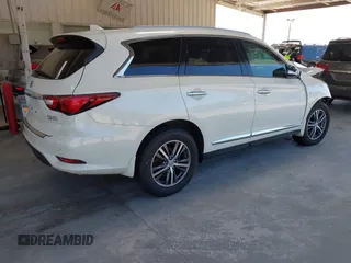 2020 Infiniti QX60 Luxe with VIN 5N1DL0MM9LC503000, listed as a IAAI auction lot 41650483 with 53,327 mi miles and . Bid and sale history available at DreamBid. Image 4.