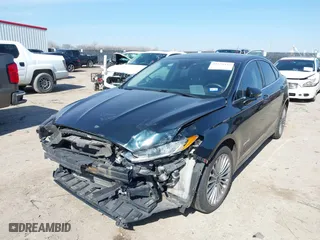 2014 Ford Fusion Titanium Hybrid with VIN 3FA6P0RU9ER111834, listed as a IAAI auction lot 41570337 with 121,099 mi miles. Bid and sale history available at carsss.com. Image 17.
