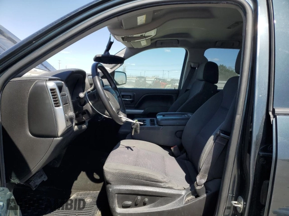 2017 Chevrolet Silverado 1500 LT with VIN 1GCRCREH5HZ179984, listed as a Copart auction lot 53005025 with 141,083 mi miles and Salvage Title. Bid and sale history available at DreamBid. Image 7.