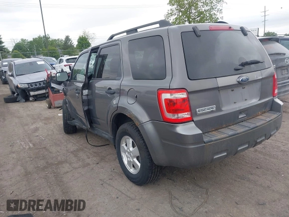 2012 Ford Escape XLT with VIN 1FMCU0D70CKB57640, listed as a IAAI auction lot 42364980 with 122,652 mi miles and . Bid and sale history available at DreamBid. Image 3.