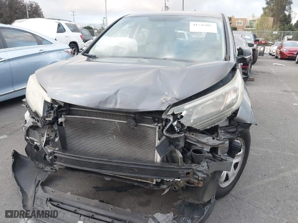 2015 Honda CR-V LX with VIN 3CZRM3H39FG706958, listed as a IAAI auction lot 41549880 with 85,567 mi miles. Bid and sale history available at carsss.com. Image 6.