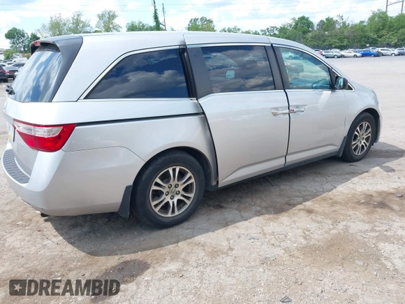 2012 Honda Odyssey EX-L with VIN 5FNRL5H67CB139701, listed as a IAAI auction lot 42233283 with 147,143 mi miles and . Bid and sale history available at DreamBid. Image 4.