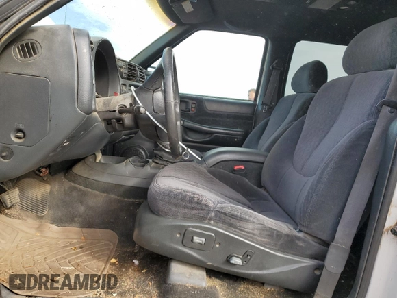 2001 GMC Jimmy SLT with VIN 1GKDT13W412121445, listed as a Copart auction lot 76842164 with 277,068 mi miles and Salvage Title. Bid and sale history available at carsss.com. Image 7.