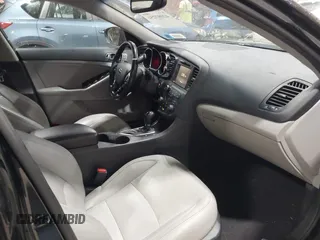 2013 Kia Optima EX with VIN 5XXGN4A73DG254485, listed as a IAAI auction lot 42097254 with 157,053 mi miles. Bid and sale history available at carsss.com. Image 5.
